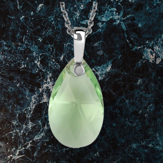 Peridot Crystal Pendant (Pear 22x13) in Platinum Overlay Sterling Silver with Lobser Clasp (Size - 20) with Stainless Steel Chain